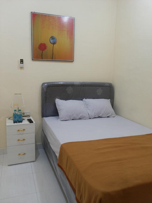 Beto Guesthouse Kalasan Rum bild